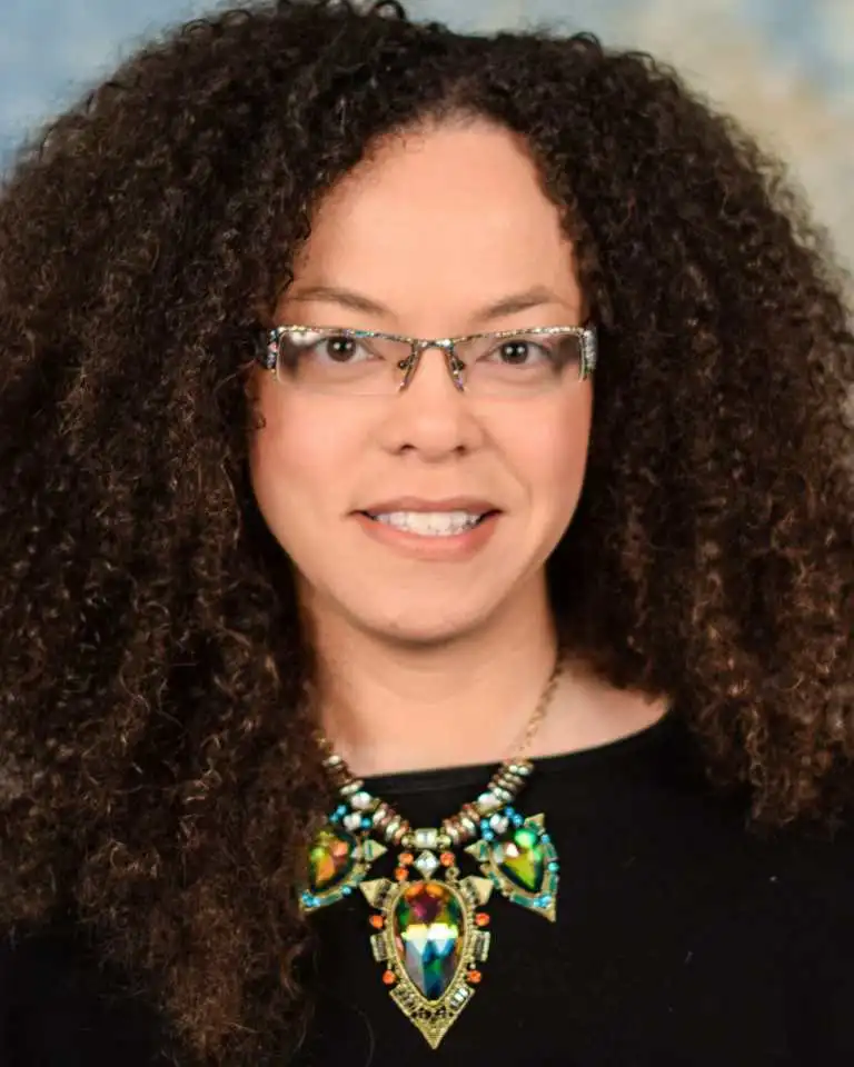 Portrait photograph of Reyma McCoy McDeid.